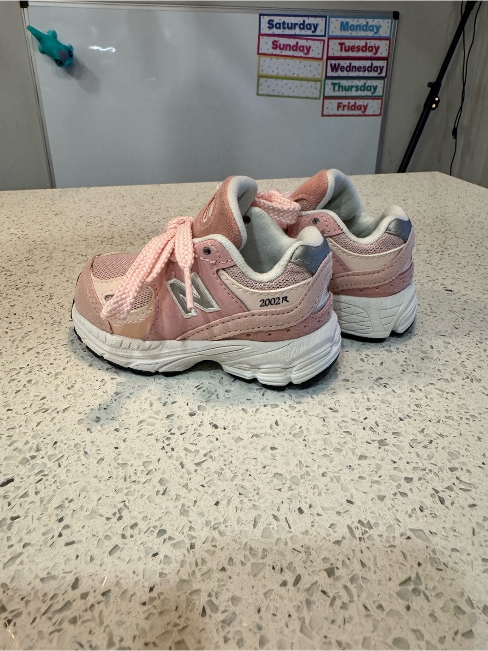New Balance Kids Pink and White 2002R Sneakers